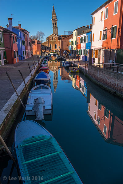 Looking down the canal at the tilted church tower—there are no parallel lines in this image!